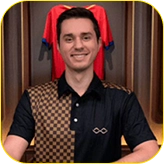 Melbet: Male dealer smiling